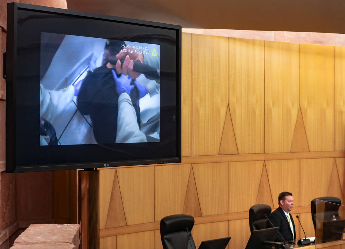 Body camera footage shows police restraining Reiner Sommer during a fact-finding review of his ...
