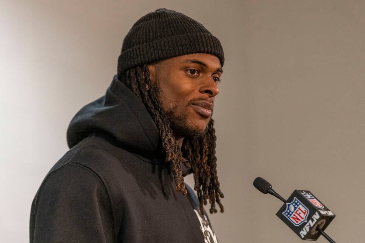 Raiders wide receiver Davante Adams smiles during a news conference after taking a 22-16 win in ...