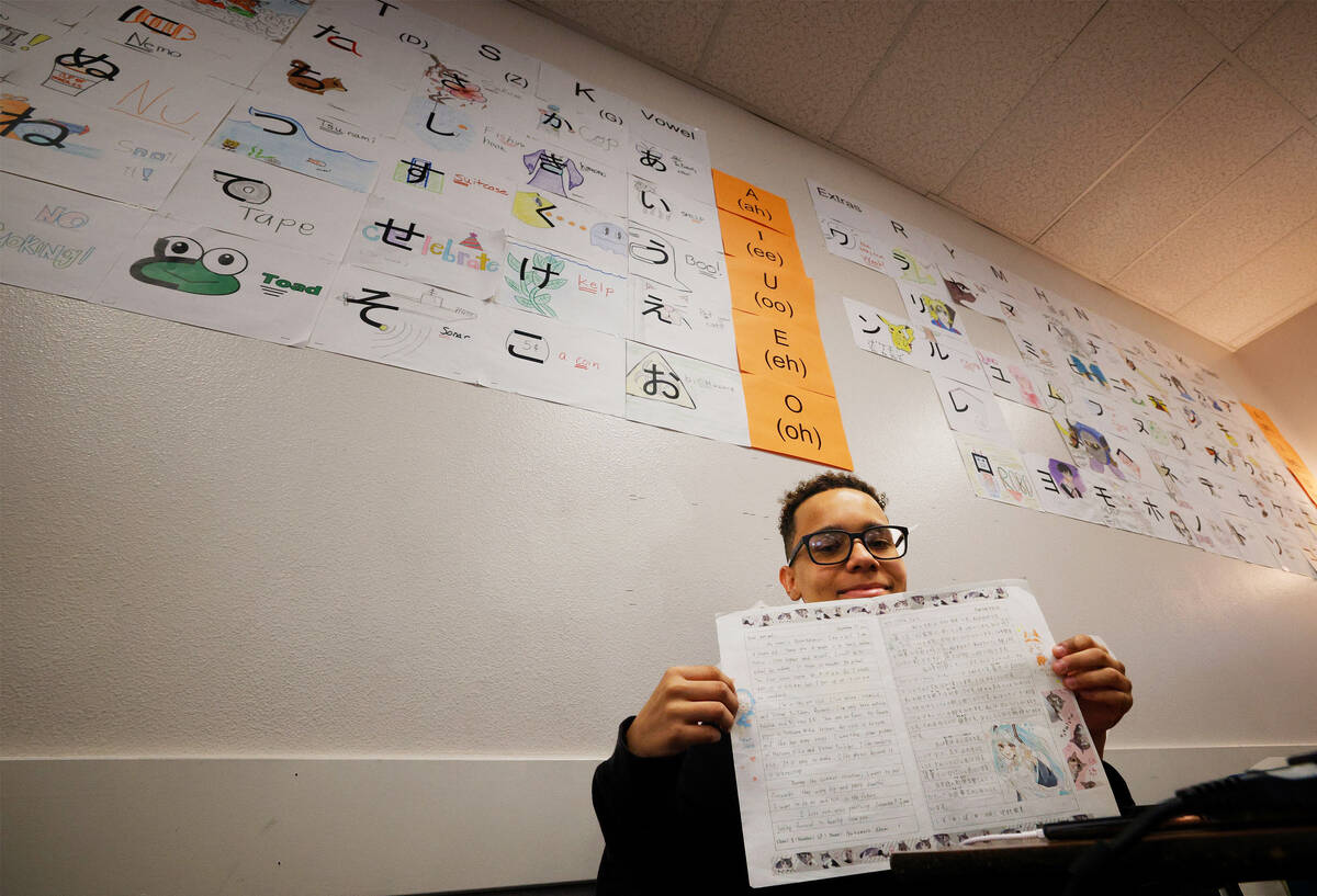 Silverado High School sophomore Lyric Smith, 15, shows a letter from his Japanese pen pal, Akem ...