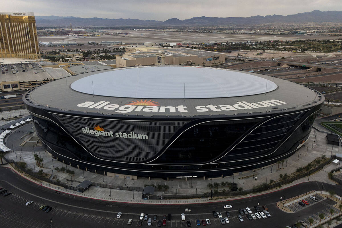 Aerial view of Allegiant Stadium and the Las Vegas Strip on Tuesday, December 7, 2021. (Michael ...