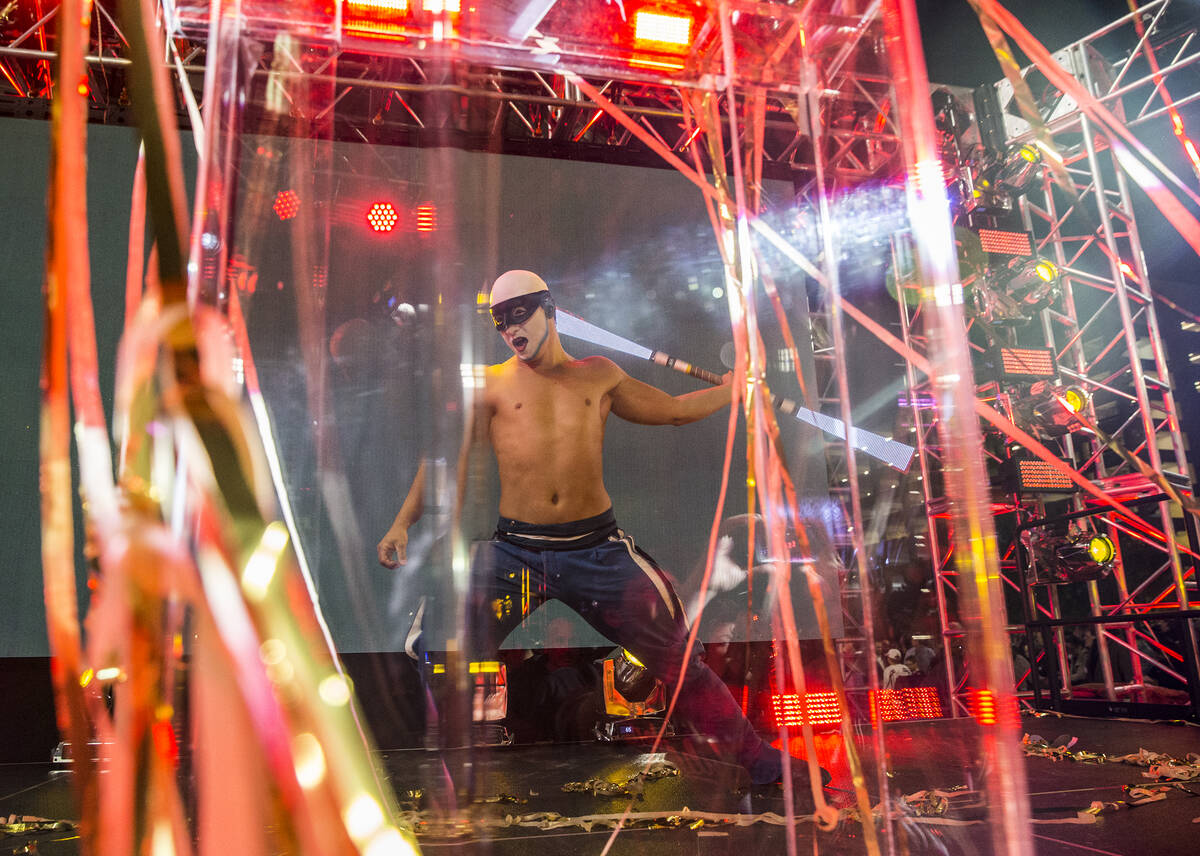 A Cirque du Soleil performer dances during a ceremony to unveil the Las Vegas NHL expansion fra ...