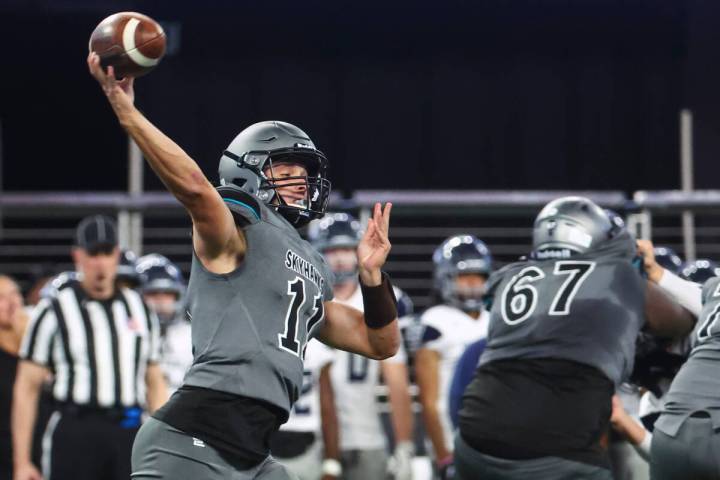 Silverado's Brandon Tunnell (11) throws a pass during the first half of the Class 4A football s ...