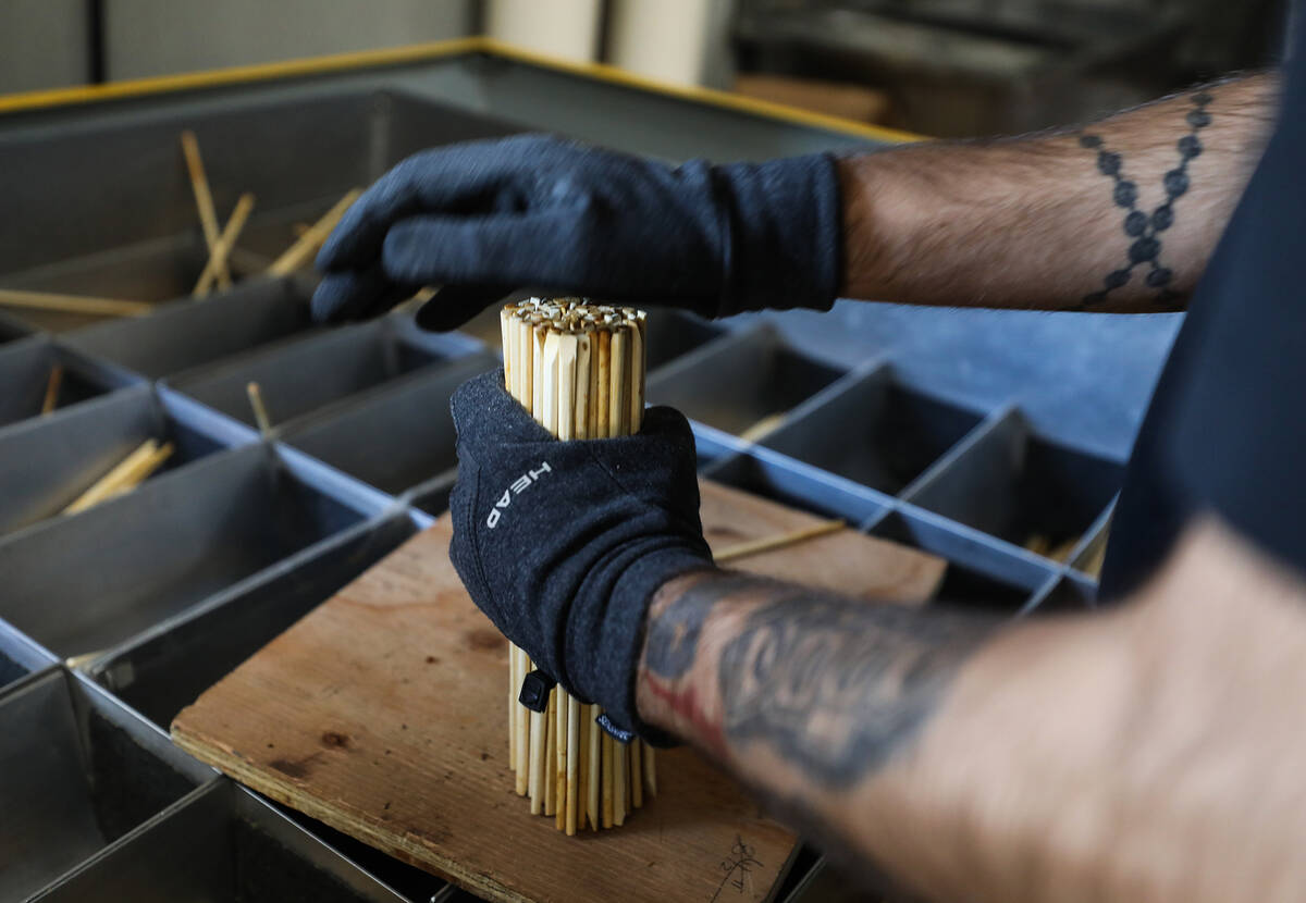 Caleb Simmons sorts used chopsticks at ChopValue’s factory in Las Vegas, Tuesday, Nov. 2 ...