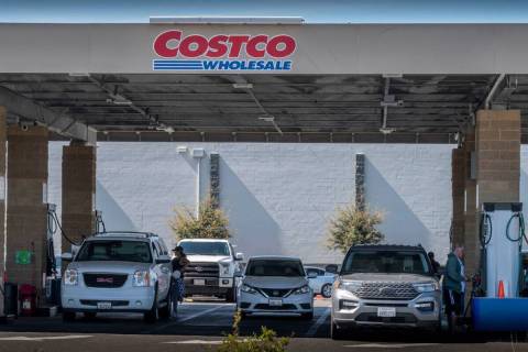 Drivers line up for gas at the Costco in Elk Grove in March. The national average per-gallon pr ...