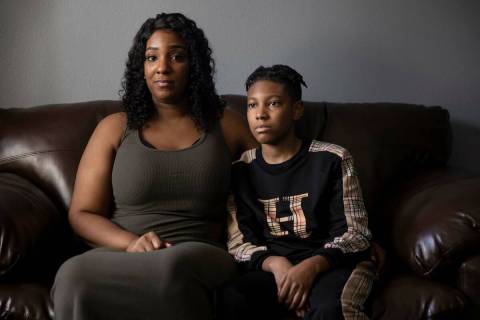 Jasmen Jackson, left, and son Amir, then 12, at Harry Peetris Law Office on April 4, 2022, in L ...
