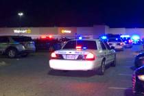 In this image from video, Virginia police respond to the scene of a fatal shooting at a Walmart ...