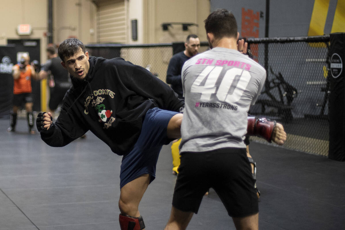 MMA fighter Biaggio Ali Walsh, grandson of legendary boxer Muhammad Ali, spars with featherweig ...