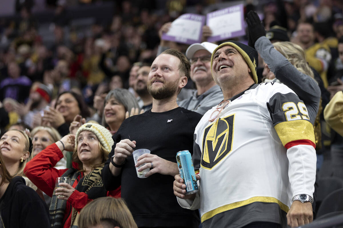 Golden Knights fans beam at the big screen after center William Karlsson (71) scored a goal dur ...
