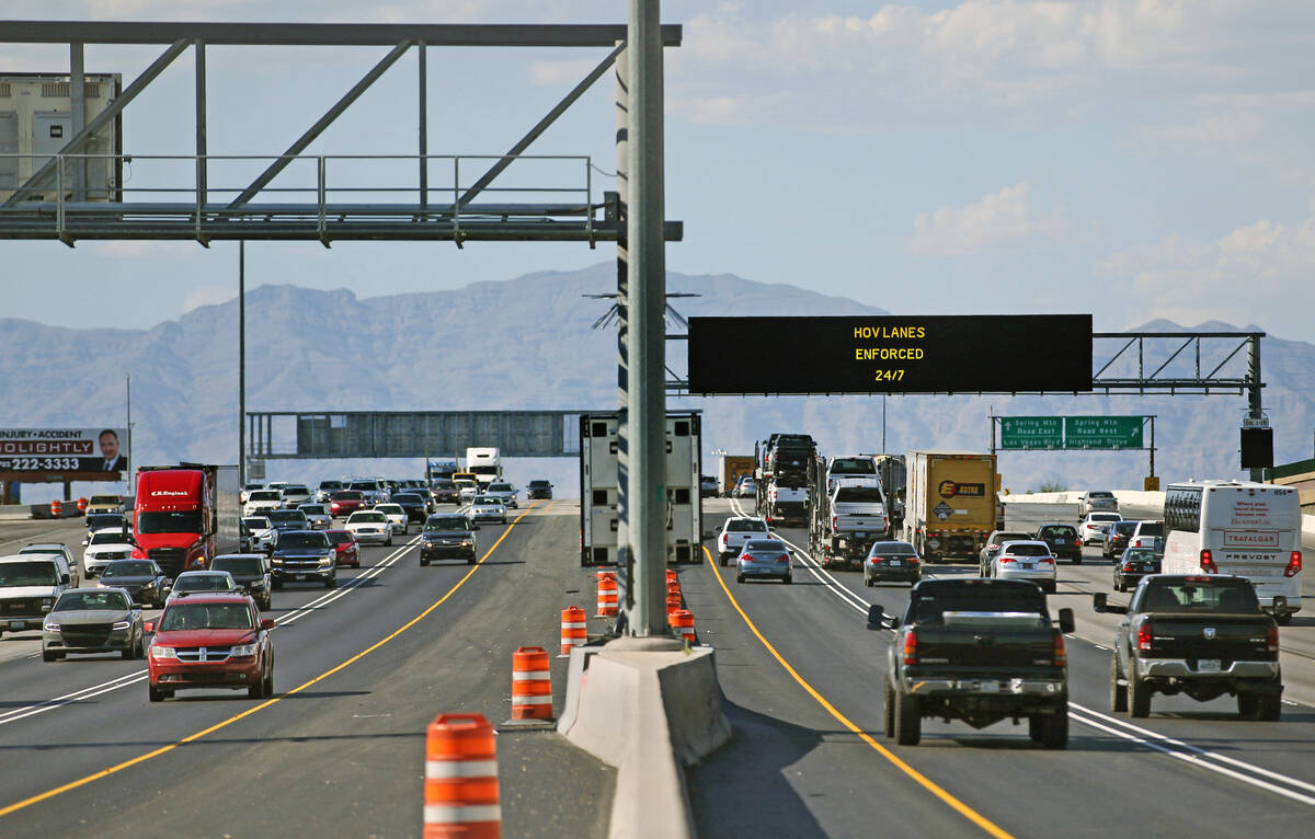 The high occupancy vehicle lanes are largely empty in both directions on Interstate 15 near the ...