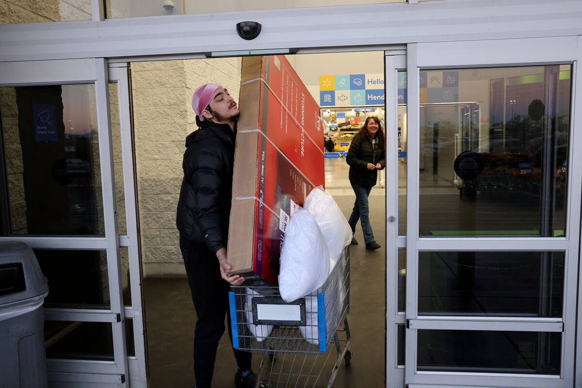 Chris Hoskins and his Black Friday deal — $228 for a 65 inch TV — try to roll out ...