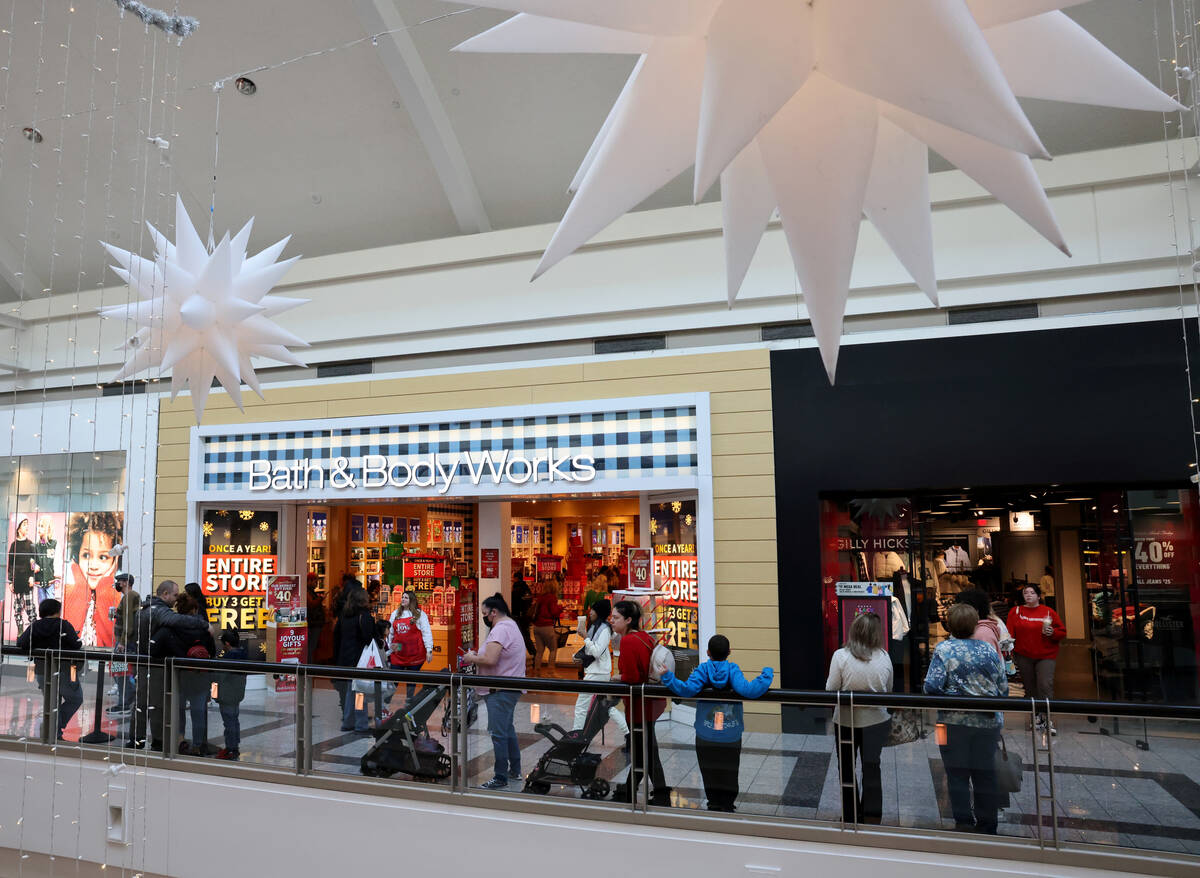 Shoppers line up for Black Friday deals at Bath & Body Works at Galleria at Sunset mall in ...