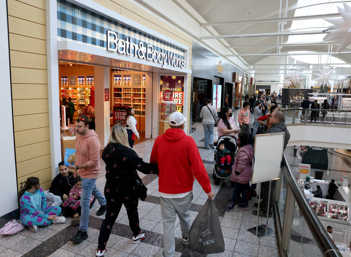 Shoppers line up for Black Friday deals at Bath & Body Works at Galleria at Sunset mall in ...