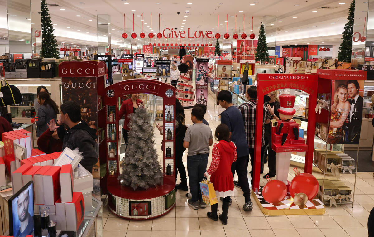 People shop for Black Friday deals at Macy’s at Galleria at Sunset mall in Henderson Fri ...