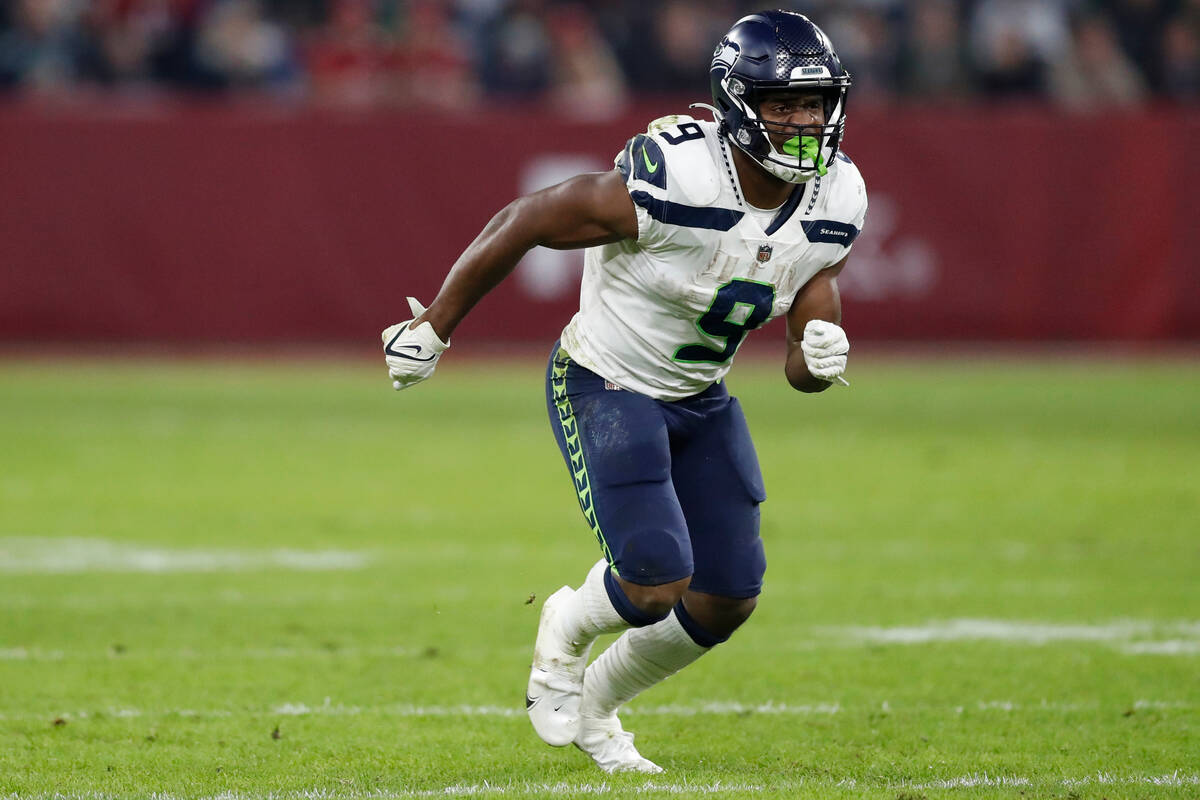 Seattle Seahawks running back Kenneth Walker III (9) in action during an NFL football game agai ...