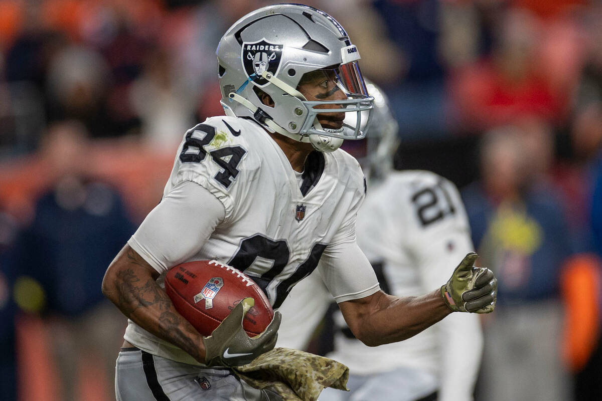 Raiders wide receiver Keelan Cole (84) runs for more yards on a return during the second half o ...