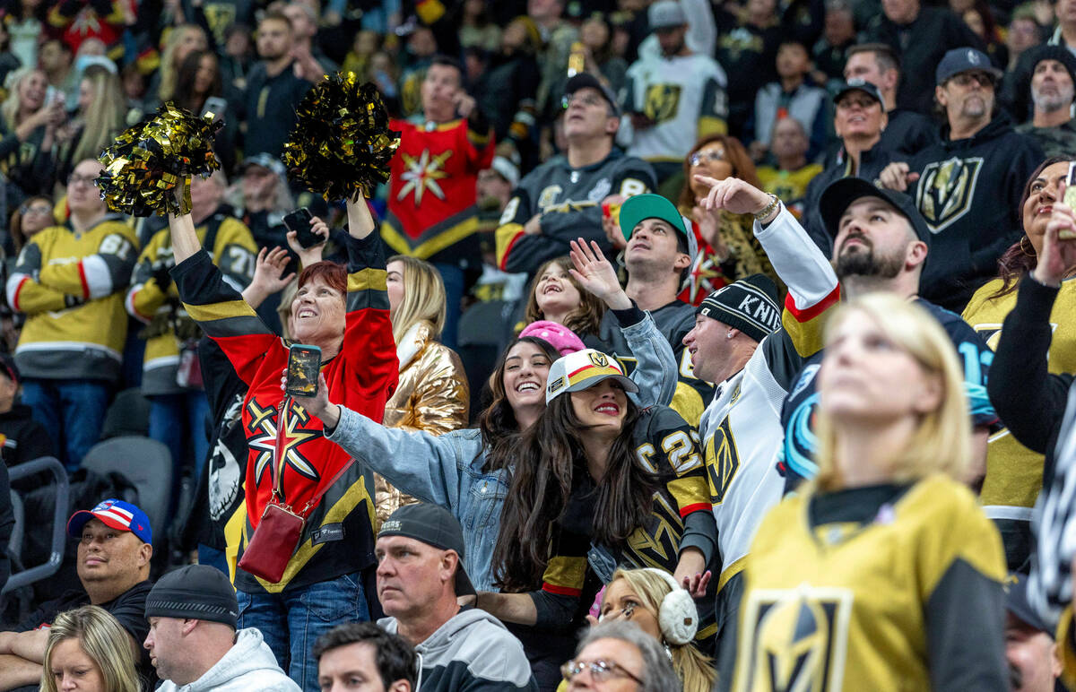 Golden Knights fans dance during a timeout versus the Seattle Kraken during the third period of ...