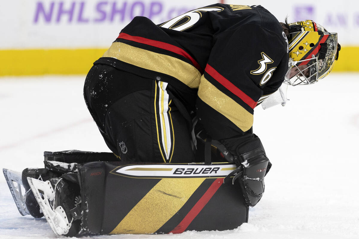 Golden Knights goaltender Logan Thompson (36) reacts after missing a save during the second per ...