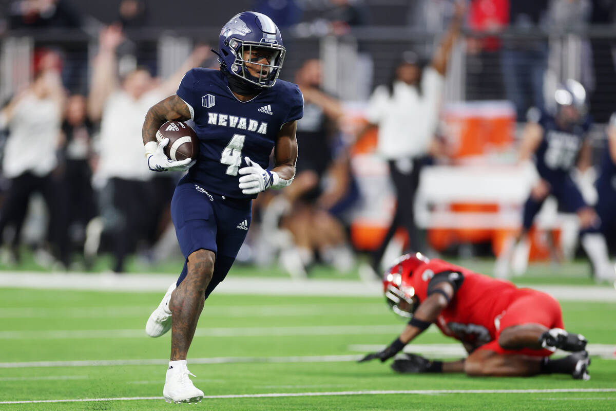 Nevada Wolf Pack wide receiver BJ Casteel (4) runs the ball after a catch for a touchdown again ...
