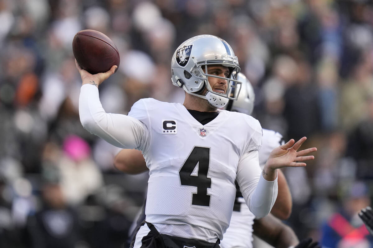 Las Vegas Raiders quarterback Derek Carr (4) throws during the first half of an NFL football ga ...