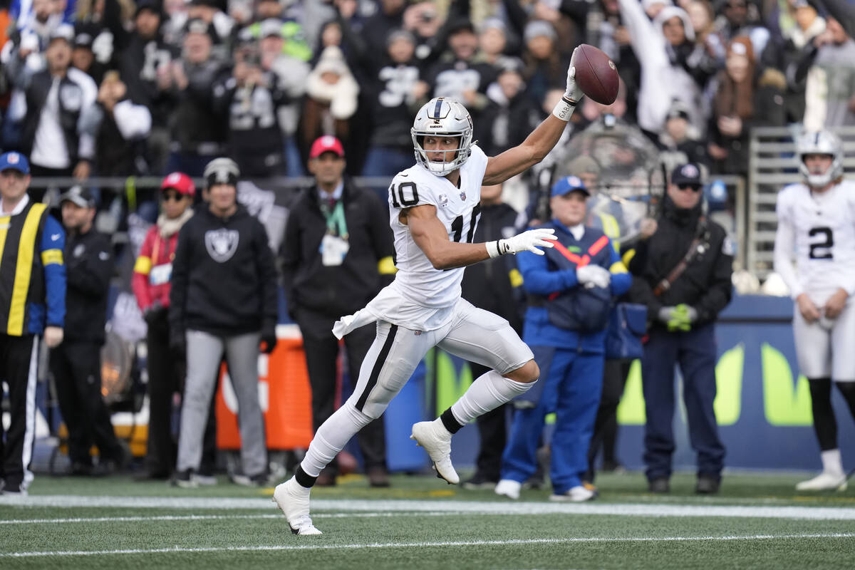Las Vegas Raiders wide receiver Mack Hollins runs for a touchdown during the first half of an N ...