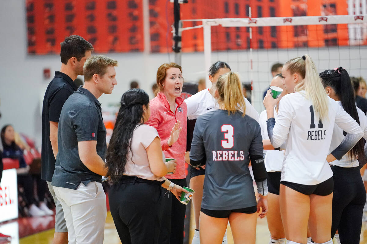 Coach Dawn Sullivan talks to the UNLV volleyball team during its match against Utah State on Th ...