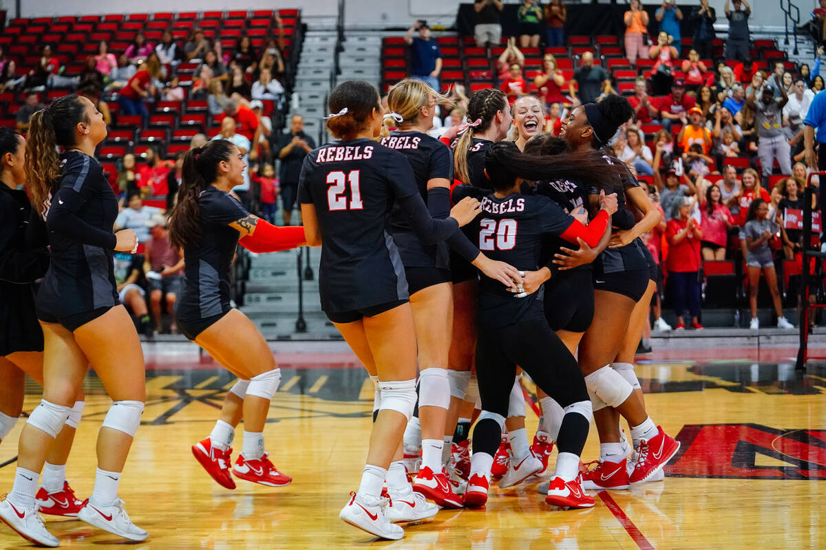 The UNLV volleyball team celebrates during a 3-0 victory against Boise State on Saturday, Oct. ...