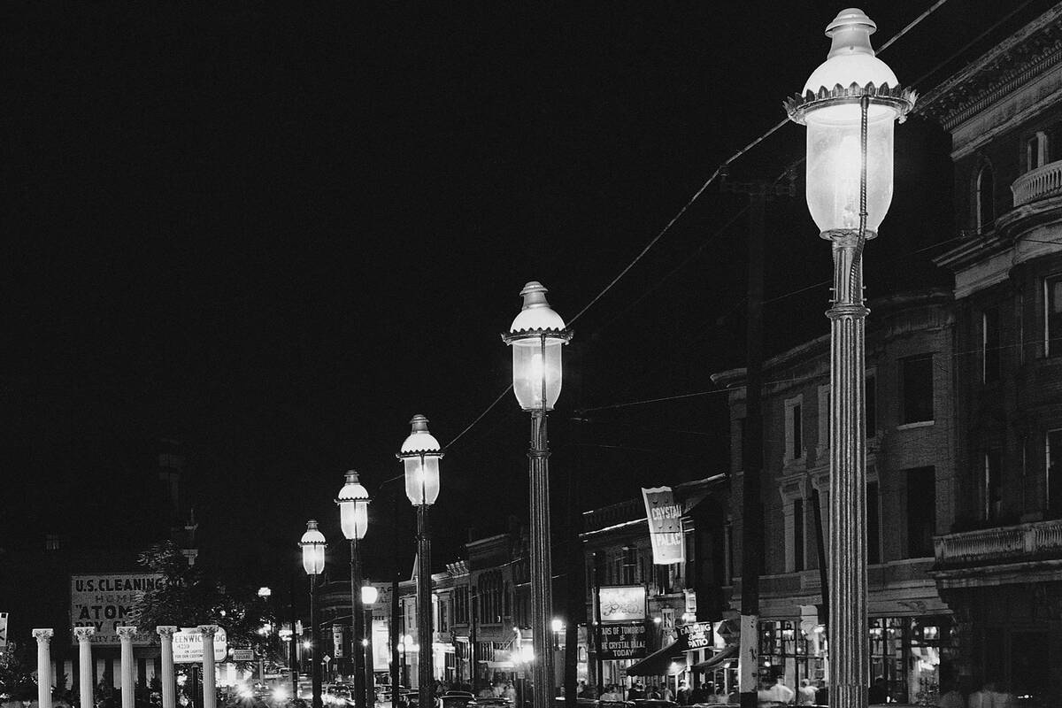 FILE - Gas lamps illuminate St. Louis' Gaslight Square on April 2, 1962. "Gaslighting&quot ...