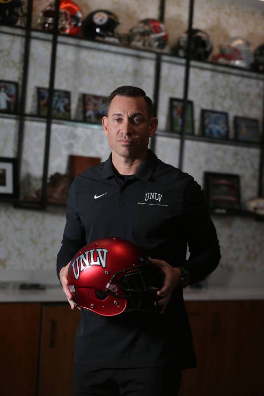 UNLV football head coach Marcus Arroyo is photographed in his office at the Fertitta Football C ...