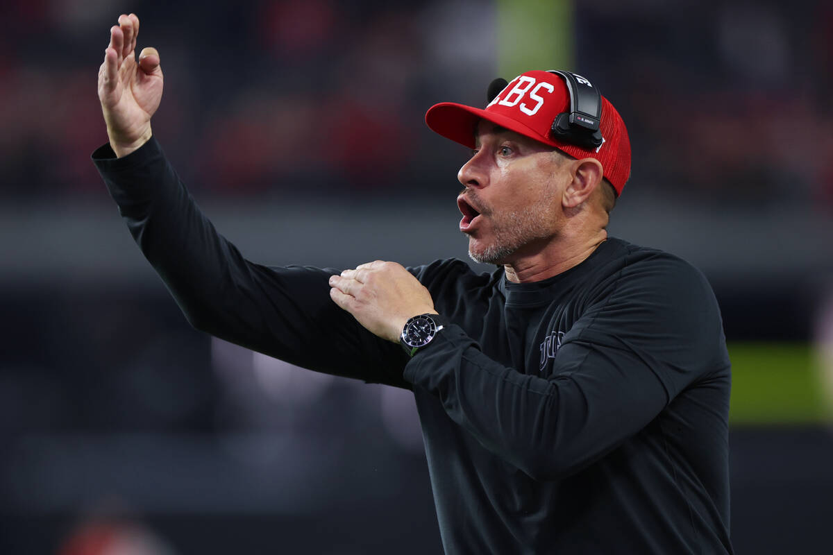 UNLV Rebels head coach Marcus Arroyo yells from the sidelines during a play in the second half ...