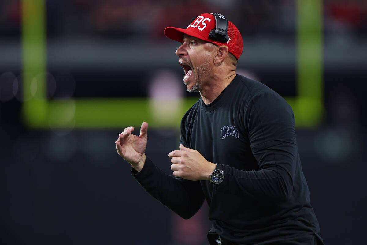 UNLV Rebels head coach Marcus Arroyo yells from the sidelines during a play in the second half ...