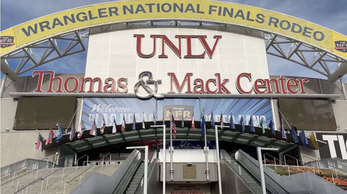 The Wrangler National Finals Rodeo banner hung up at the Thomas & Mack Center on Nov. 28, 2022. ...