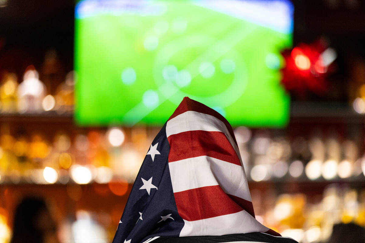 Charles King of Las Vegas watches the United States play against Iran in the World Cup, during ...