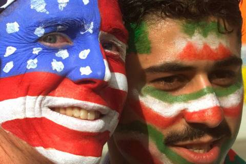 FILE - Mike Moscrop, left, from Orange County, Calif., poses with Amir Sieidoust, an Iranian su ...