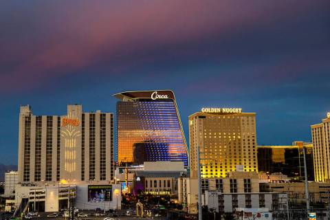 This Oct. 20, 2021, file photo shows the downtown Las Vegas skyline at dusk in Las Vegas. (Benj ...