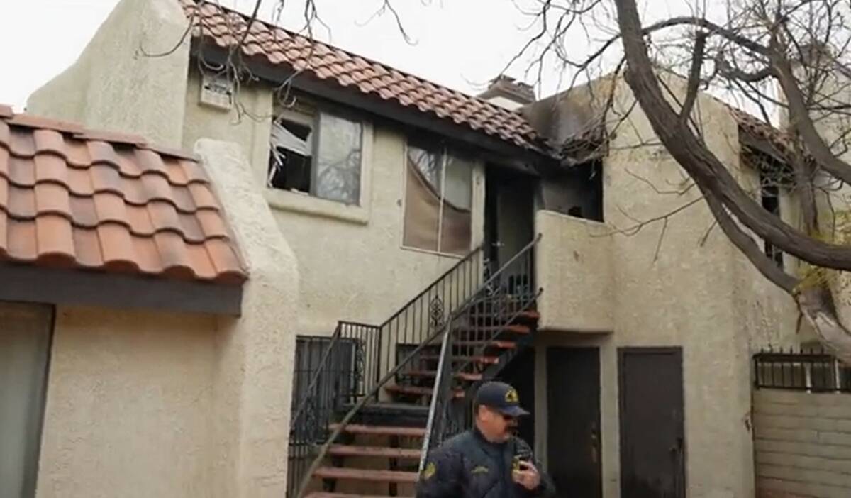Firefighters respond to an apartment fire in the 2200 block of Sun Avenue in North Las Vegas on ...