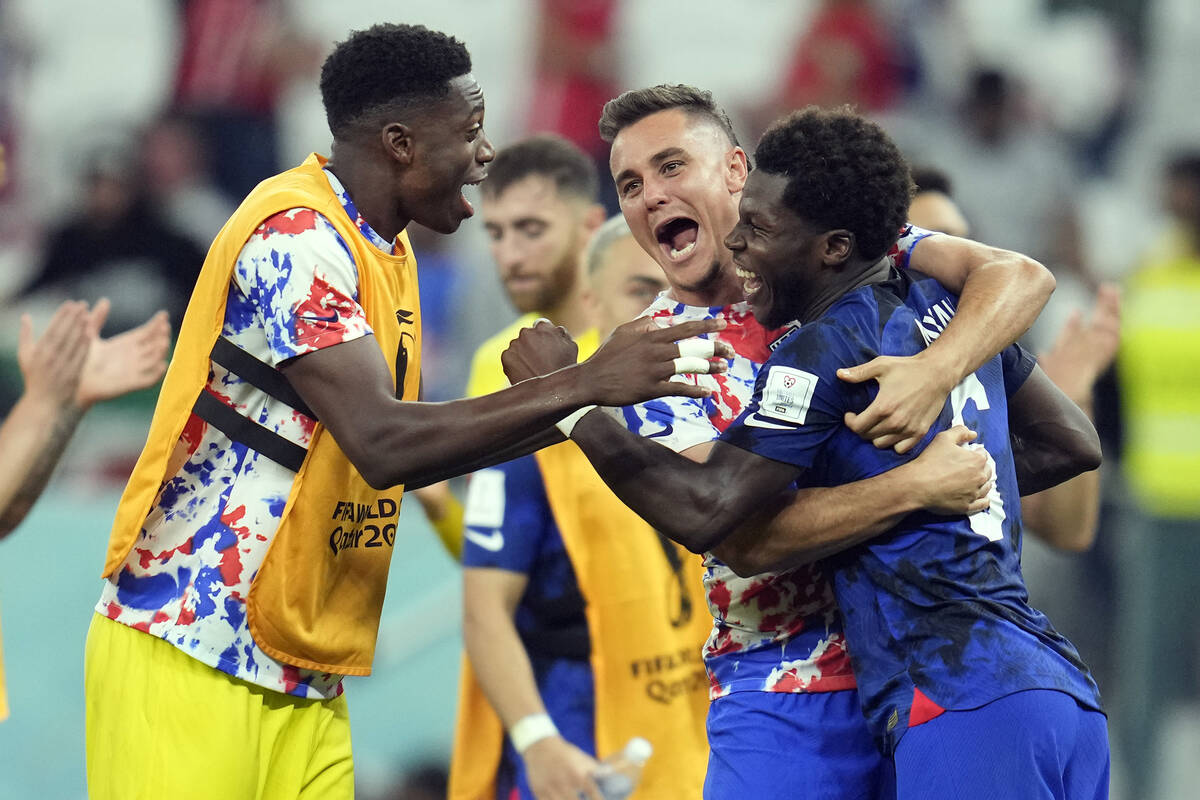 United States' Yunus Musah, right, Aaron Long, center, and United States' goalkeeper Sean Johns ...