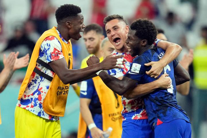 United States' Yunus Musah, right, Aaron Long, center, and United States' goalkeeper Sean Johns ...