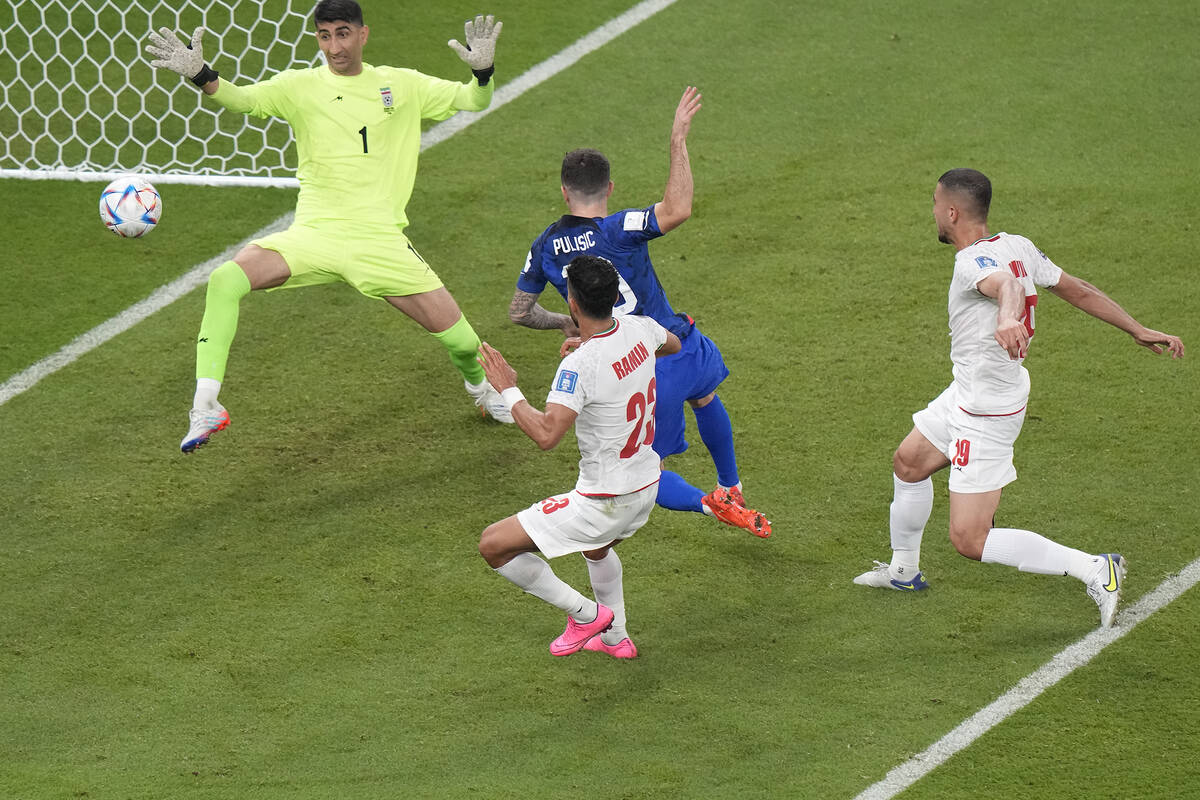 Christian Pulisic of the United States scores his side's opening goal during the World Cup grou ...