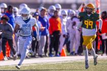 Bishop Gorman RB Micah Kaapana (22) streaks down the sideline for another long touchdown run aw ...