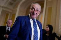FILE - Senate Majority Leader Chuck Schumer, D-N.Y., speaks to reporters at the Capitol in Wash ...