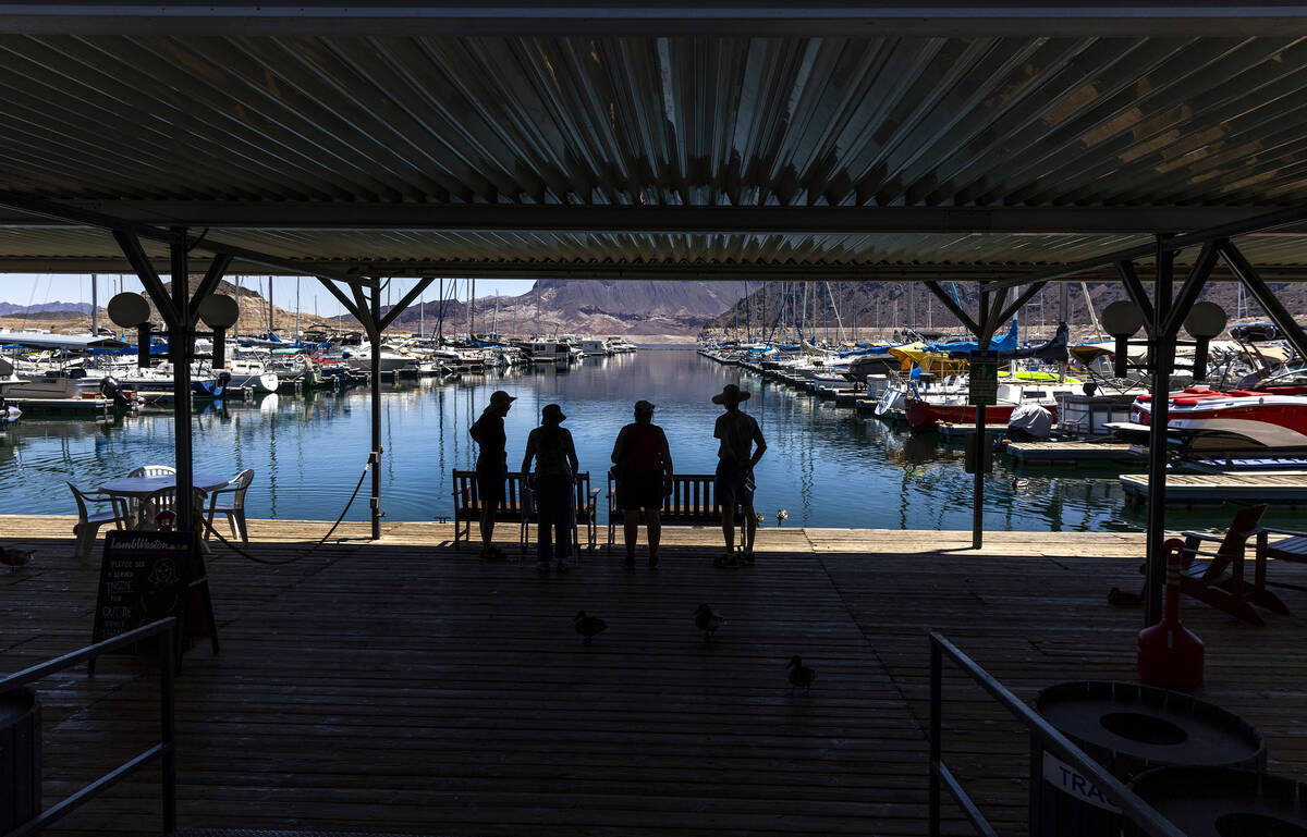 Visitors stop at the Lake Mead Marina in Hemenway Harbor in the Lake Mead National Recreation A ...