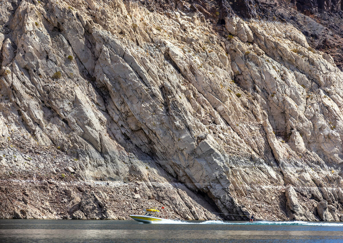 A ski boat cruises within the Boulder Canyon area at the Lake Mead National Recreation Area as ...