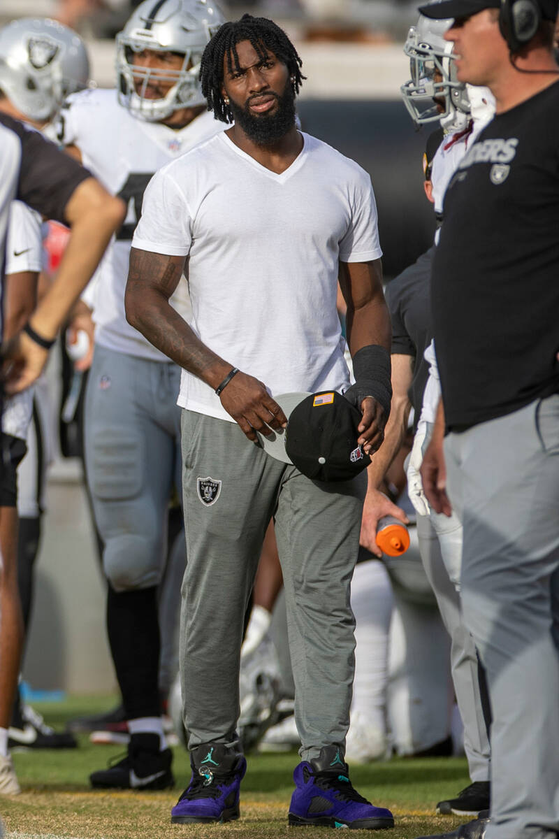 Raiders cornerback Nate Hobbs on the sideline during the second half of an NFL game against the ...