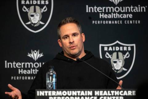 Raiders head coach Josh McDaniels speaks at a news conference before practice at the Intermount ...