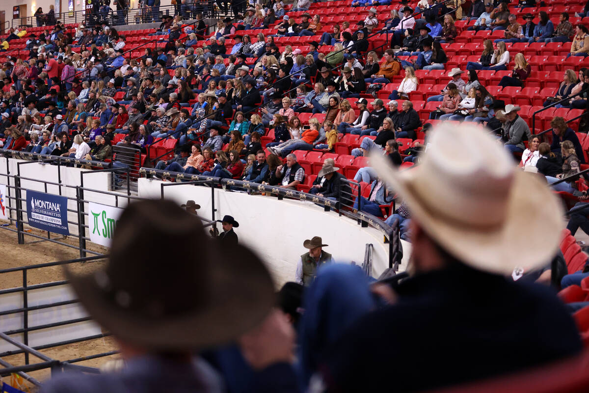 People attend the women's Wrangler National Finals Breakaway Roping event at the South Point Ar ...