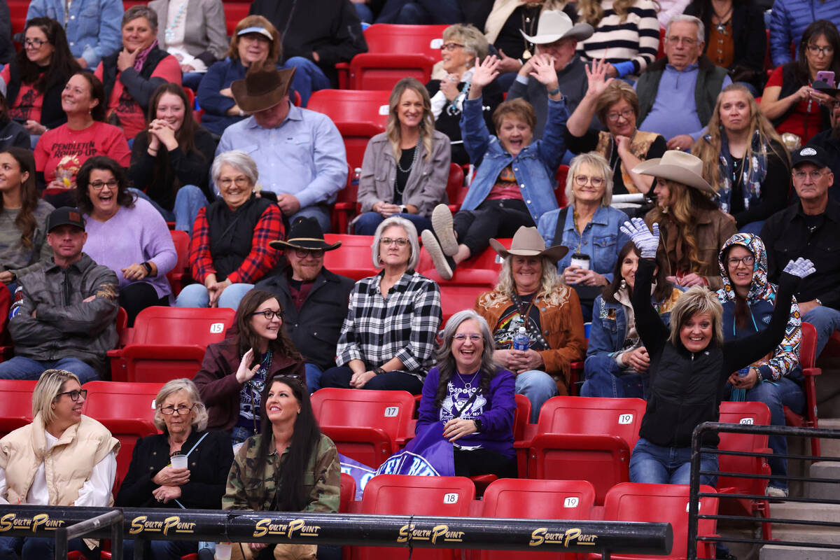 People cheer during the women's Wrangler National Finals Breakaway Roping event at the South Po ...