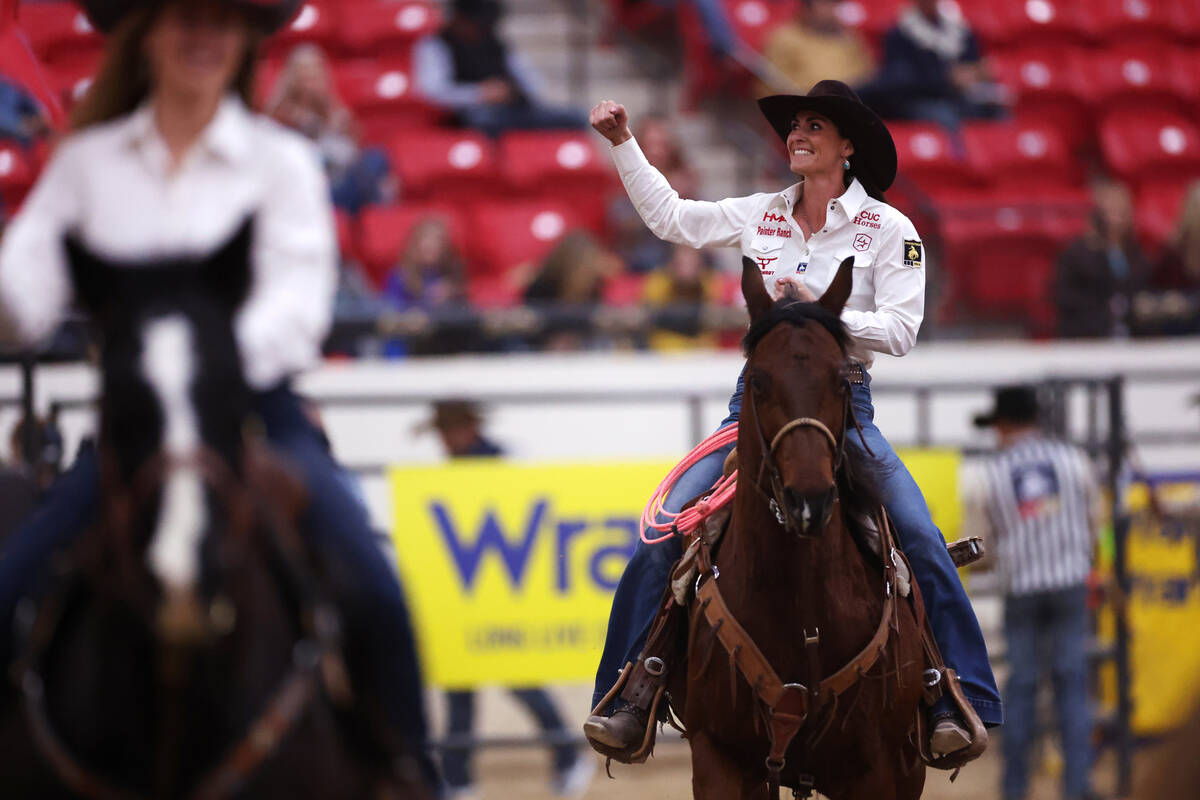 Joey Williams runs a lap with her horse after winning a round in the women's Wrangler National ...