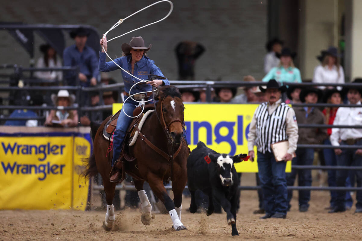 Cadee Williams competes in the women's Wrangler National Finals Breakaway Roping event at the S ...