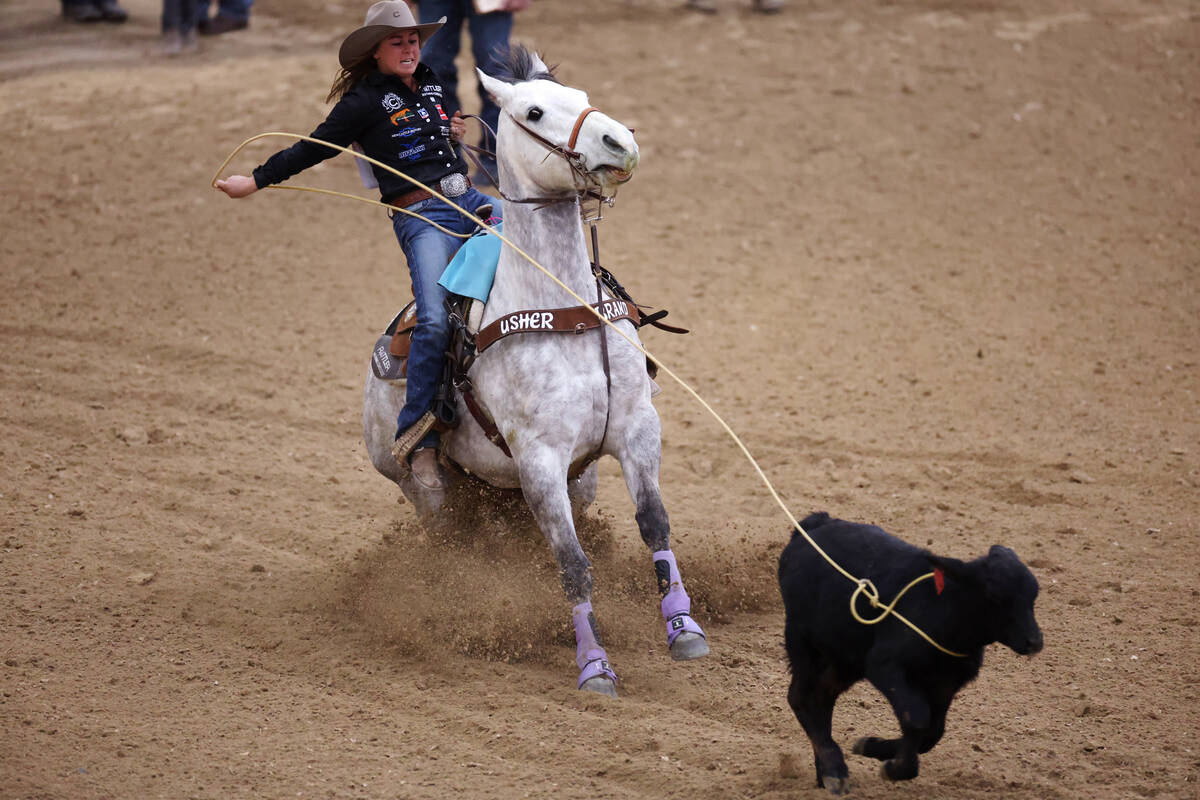 Rickie Engesser competes in the women's Wrangler National Finals Breakaway Roping event at the ...