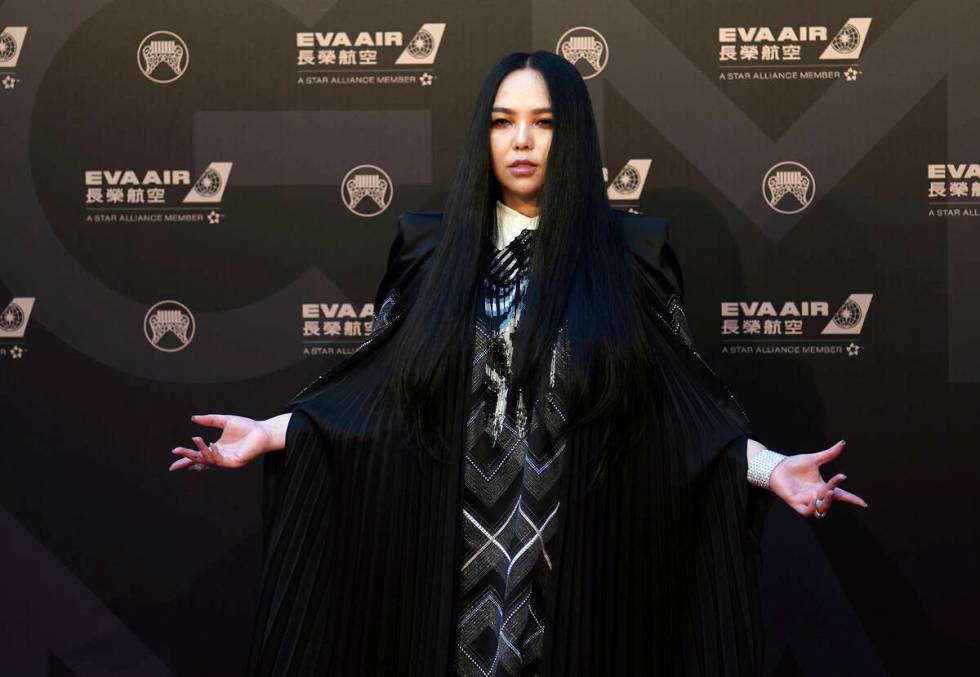 Taiwanese singer A-mei arrives at the 29th Golden Melody Awards in Taipei, Taiwan, Saturday, Ju ...